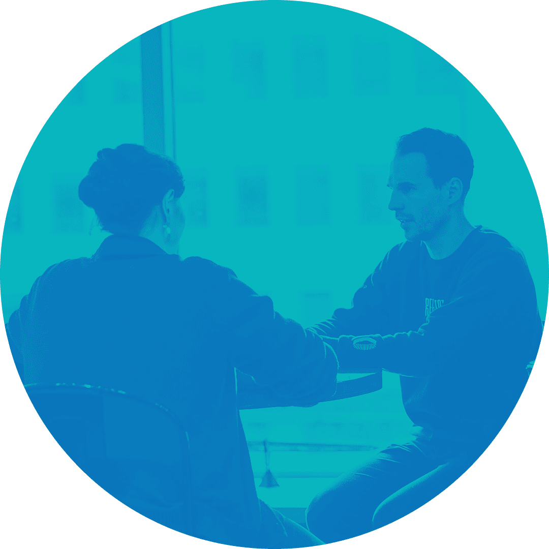 A one-on-one coversation between two Reflector employees.